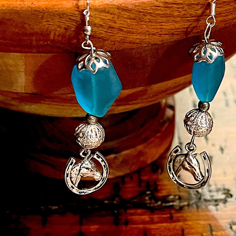 Handcrafted Murano Glass with Sterling Silver and Horse Charm. Measures 3”
